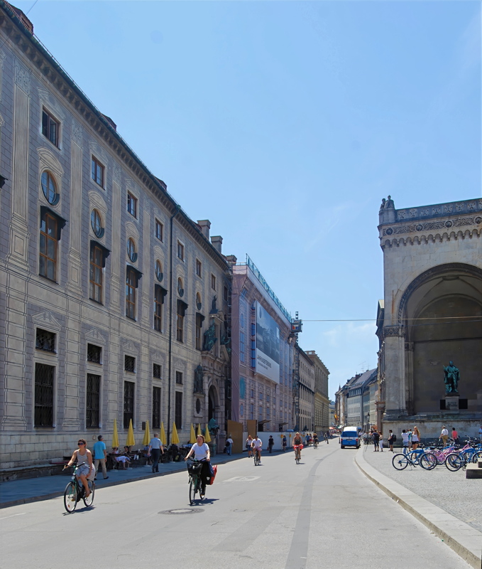 Residenzstraße looking north toward Odeonsplatz in Munich, Germany, with the ornate facade of the Munich Residenz on the left and the Feldherrnhalle on the right